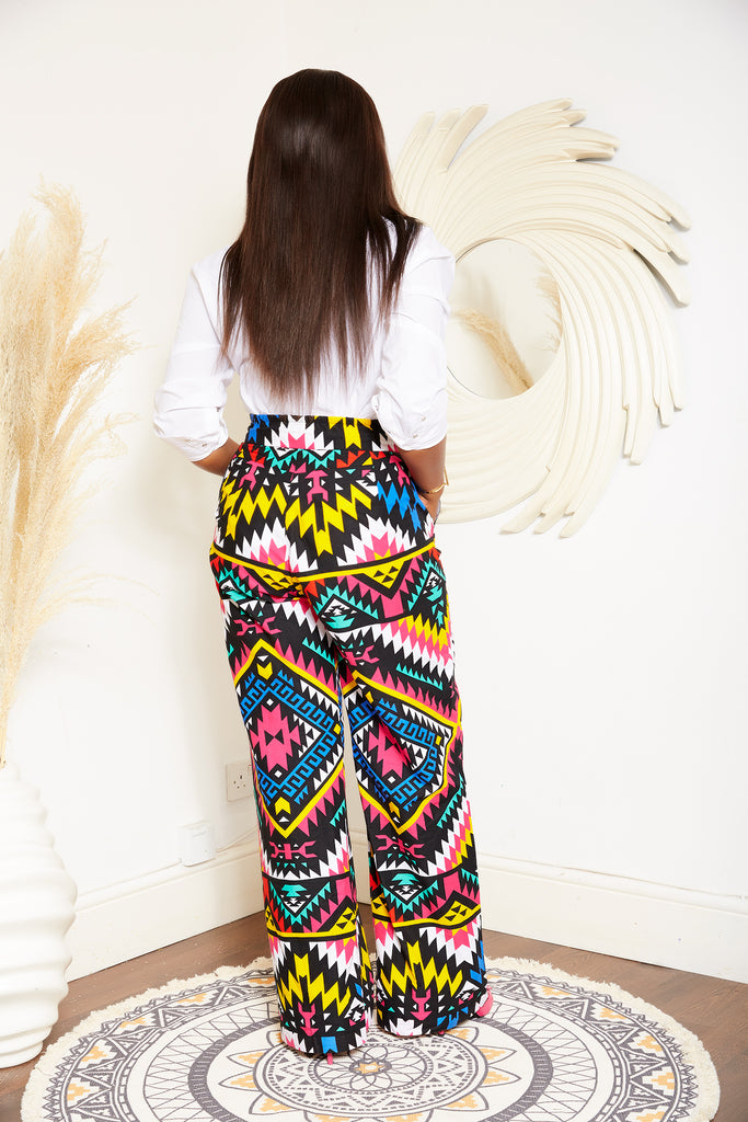 African print wide leg trousers | African print trousers UK | African print pants | African Print wide leg pants | African print clothing UK | Ready to wear African print pants | African Trouser styles | African clothing | African outfit | Ankara print  Trousers | Ankara pants for Women | Ankara Styles Trousers for ladies | African pallazo Trousers | Danshiki Trousers | High waist African print wide leg pants | African high waist pants| African loose fit Trousers | African print Trousers