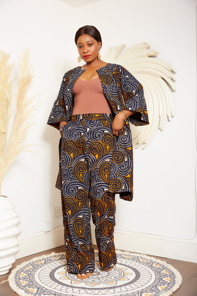 African Print Blazer | African print Jacket | African print Bomber Jacket | African Print Outerwear | Fall Fashion for African women | sustainable African Fashion | recycled African print clothing | Ethically sourced fashion | ethically sourced clothing | handmade clothing | African clothing for women | Ankara jacket | Tribal prints kimono | Floral African print clothing | Cotton Blazer | African print workwear | African clothing UK | Black-owned fashion brand | UK Based African Fashion Brand