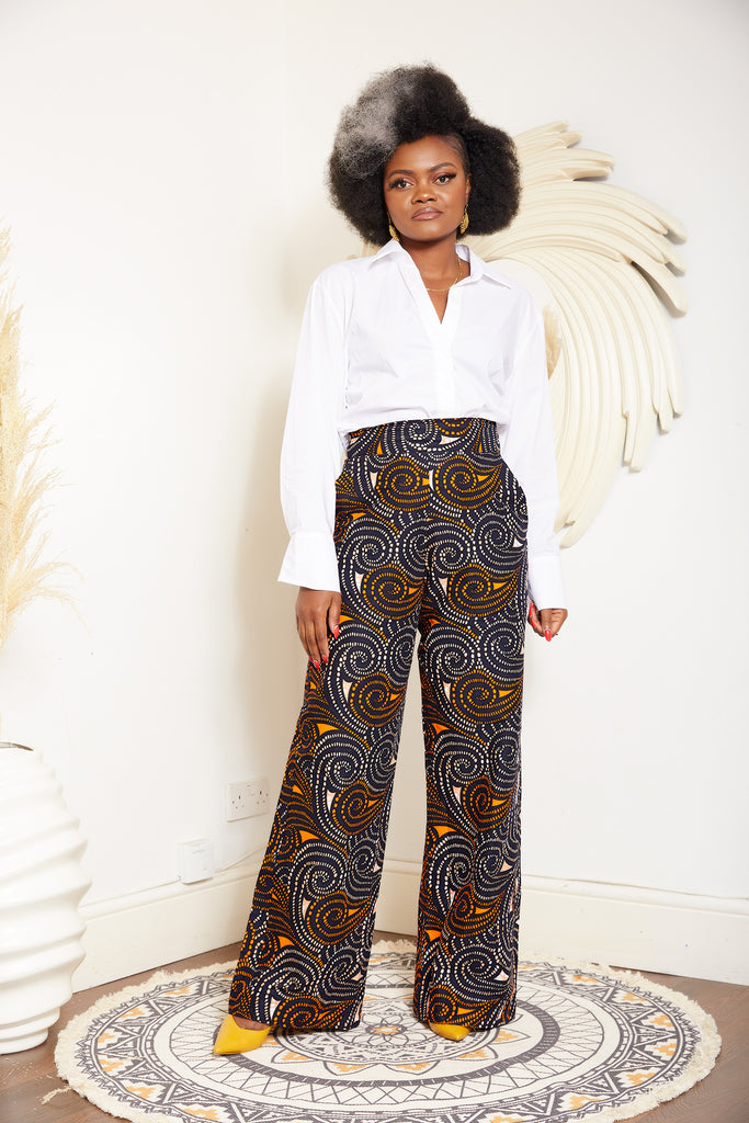 African print wide leg trousers | African print trousers UK | African print pants | African Print wide leg pants | African print clothing UK | Ready to wear African print pants | African Trouser styles | African clothing | African outfit | Ankara print  Trousers | Ankara pants for Women | Ankara Styles Trousers for ladies | African pallazo Trousers | Danshiki Trousers | High waist African print wide leg pants | African high waist pants| African loose fit Trousers | African print Trousers