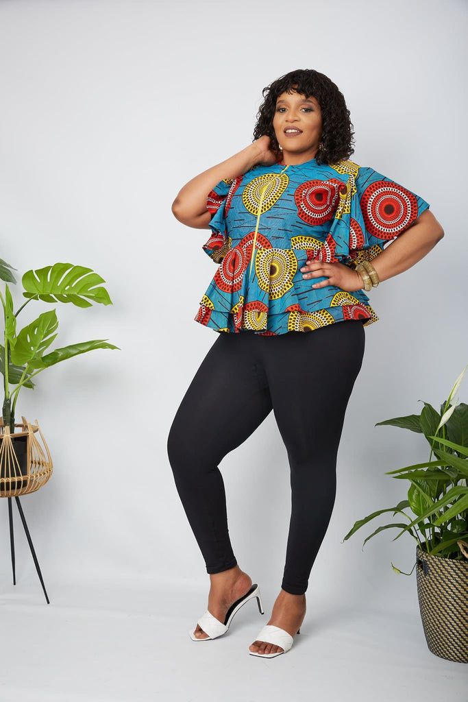 Black owned African Clothing Brand in the UK. Discover Sustainable and ethical African Print apparel handmade by local artisans in Africa. Traditional African Print Wrap Top, African Print Crop Top, modern African Print Off Shoulder top, Danshiki Shirt, Plus Size African print blouse, matching African couples outfits