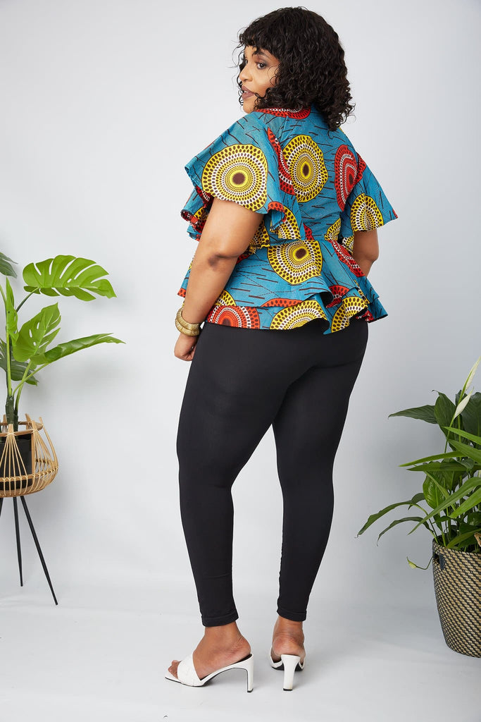 Black owned African Clothing Brand in the UK. Discover Sustainable and ethical African Print apparel handmade by local artisans in Africa. Traditional African Print Wrap Top, African Print Crop Top, modern African Print Off Shoulder top, Danshiki Shirt, Plus Size African print blouse, matching African couples outfits