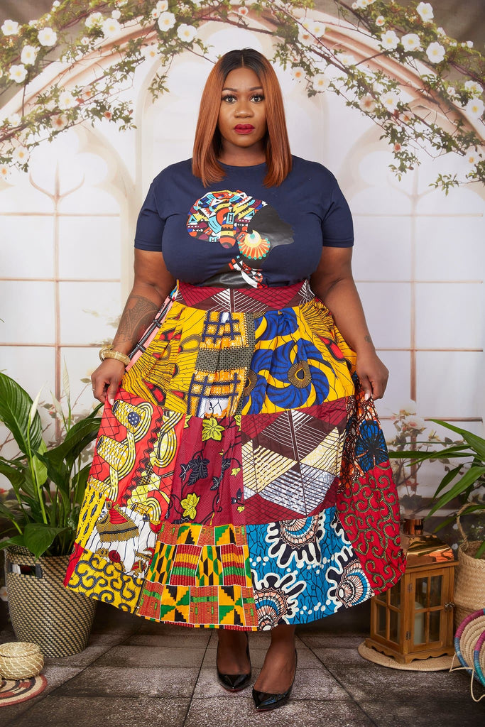Sustainable Handmade African clothing from CUMO London, discover our collections of African dresses, Ankara Skirts, African print maxi skirts, Danshiki clothing, kitenge dresses, traditional African attires ideal for African wedding, special occasion and summer parties. African party dresses with bold Ankara prints.
