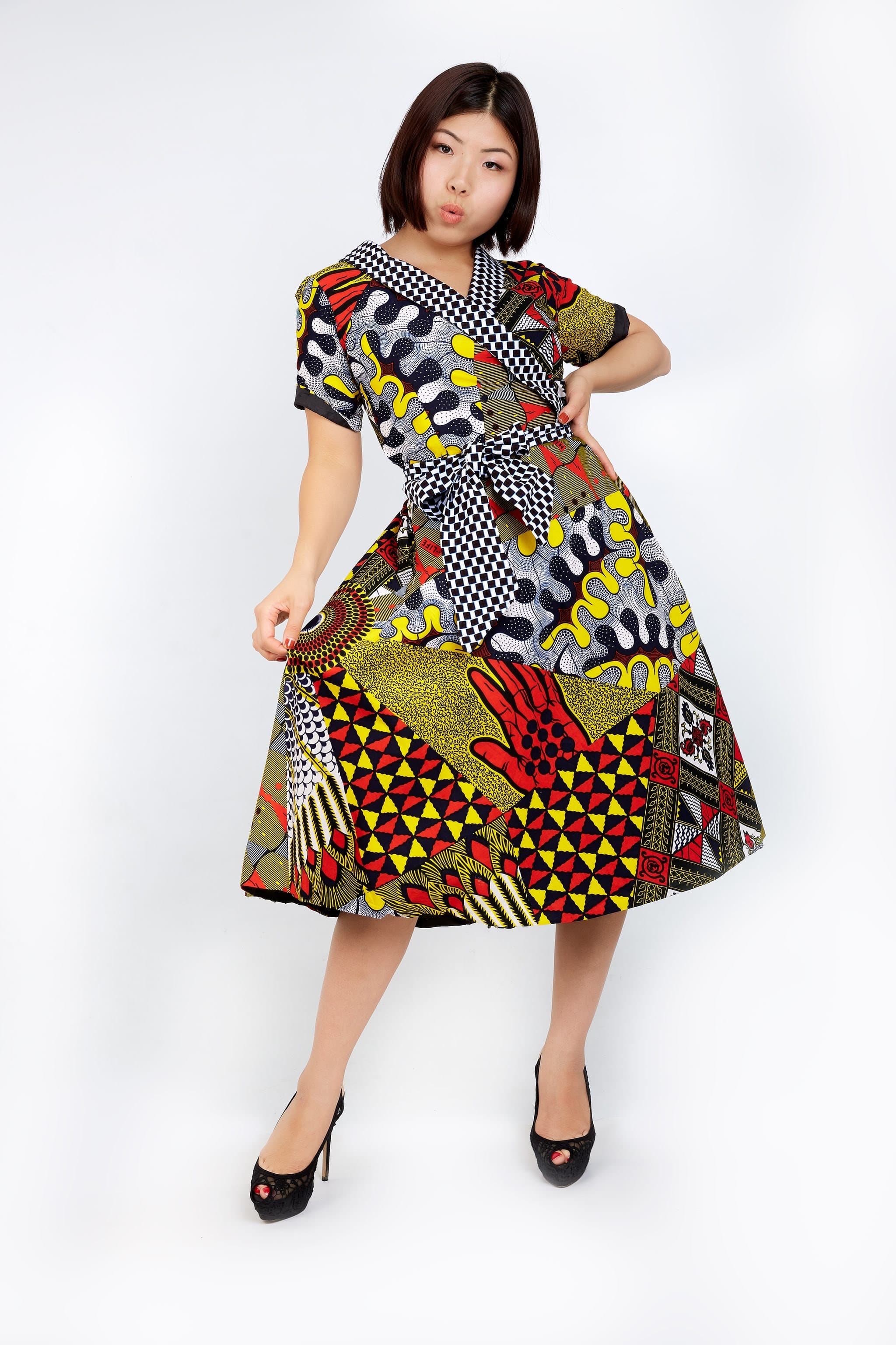 CUMO London a black-owned African Clothing brand in the UK. Handmade African apparel for women. Browse our African dresses, Danshiki clothing, Plus Size African Dresses, Ankara short dress, African print accessories, Ready to wear African attires, matching African couple clothing, African map sweatshirts in the UK. 